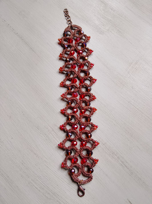 Braccialetto marrone con le pietre rosse