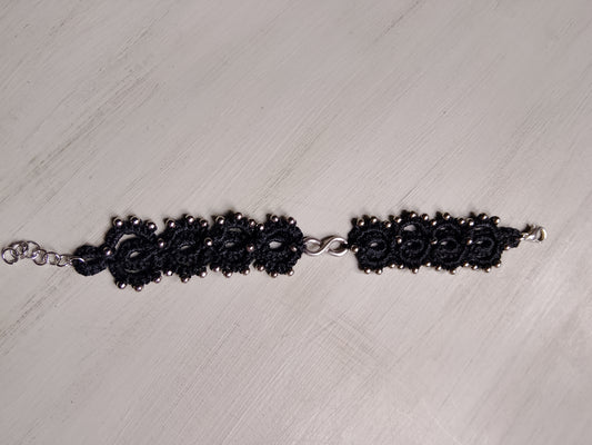 Braccialetto nero infinito